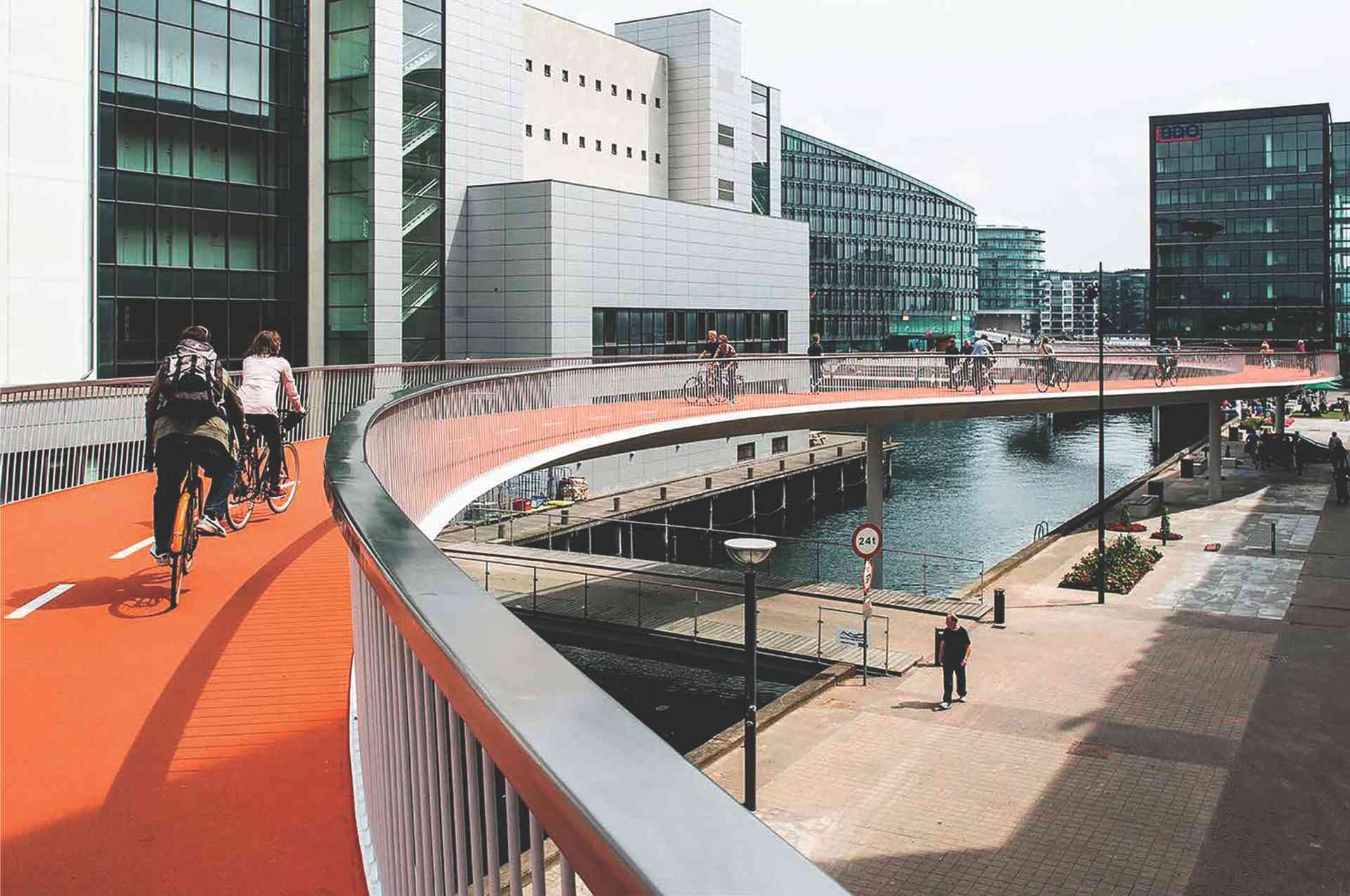 Cykelslangen, or the Bicycle Snake, is a dedicated elevated bicycle bridge in Copenhagen, Denmark. It was designed to ease cyclist traffic and improve connectivity between different areas of the city. The bridge allows cyclists to travel smoothly over the busy harbor area, connecting the Kalvebod Brygge and Islands Brygge districts. It is known for its unique and functional design, contributing to Copenhagen's reputation as a bicycle-friendly city.